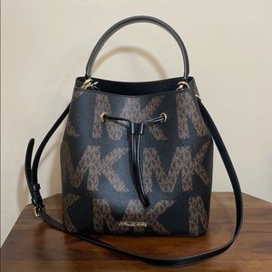 Suri Medium Graphic Logo Print Faux Leather Crossbody Bag